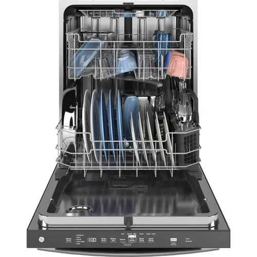 Dishwasher spray arm being cleaned with toothpick and vinegar