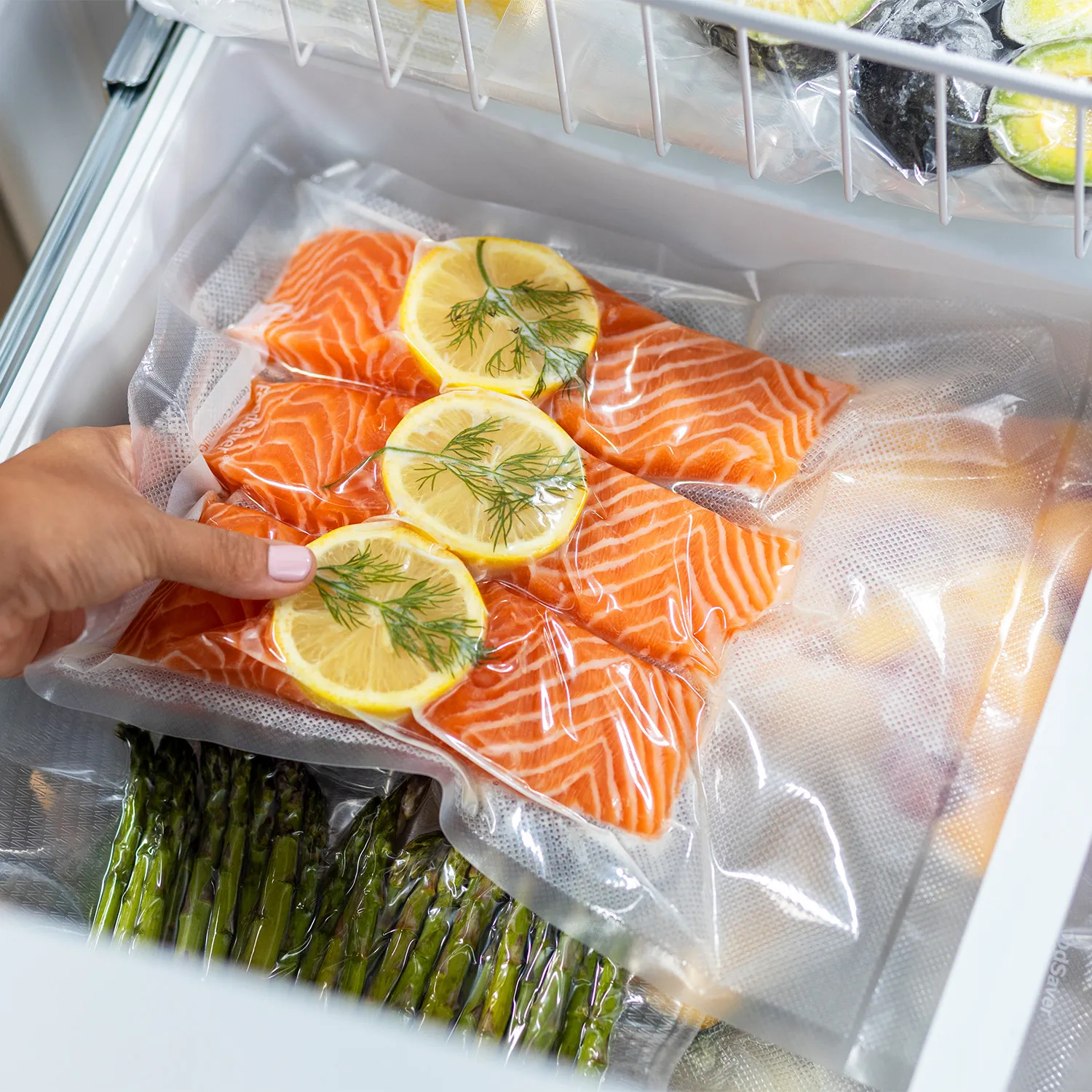 Freezer packed with food and water bottles to reduce air