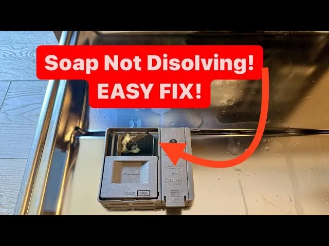 Plate blocking the dishwasher detergent dispenser cup in a loaded rack