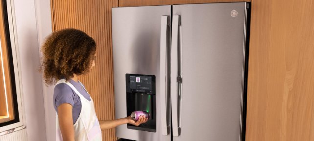 Stainless steel GE oven showing a control panel error in a modern kitchen