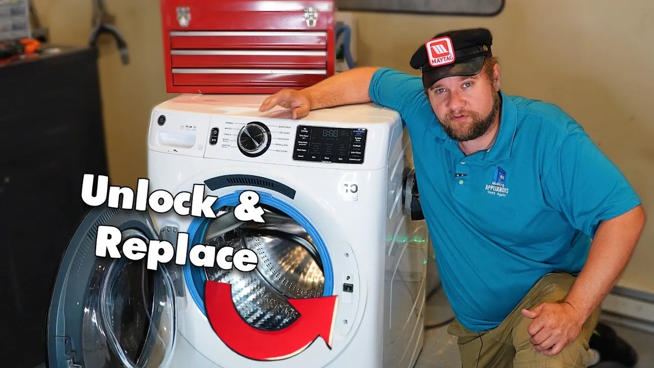 Top-loading washing machine with closed lid and water puddle nearby