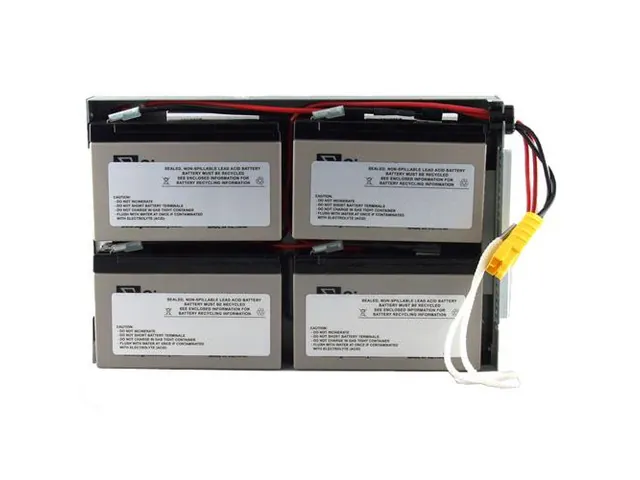 UPS battery backup warning light glowing on a desk during troubleshooting